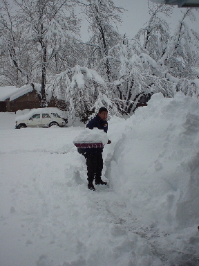 Alvaro - shoveling snow on Day 2.