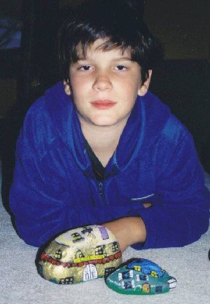 Alonso with his painted rocks.
