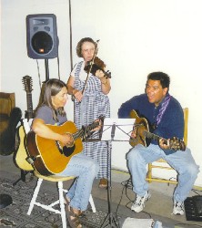 Alvaro playing music with his friends from Golden, Dale and Jan (violin).