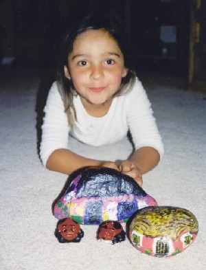 Cony with her painted rocks.