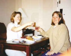 Kristin and Hild celebrate their new company.  Toronto, Canada, 2002.