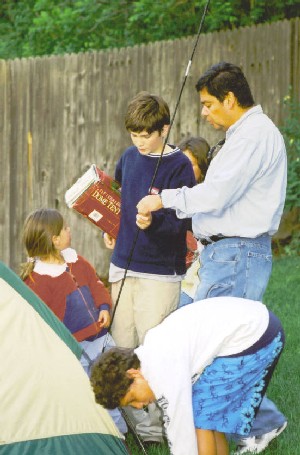 Alvaro helping the Pizarro-Kozma children set up the tent (this was a one night 