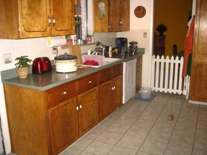 Before - Kitchen view towards dining room.