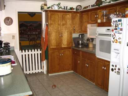  Before - Kitchen view towards dining room.