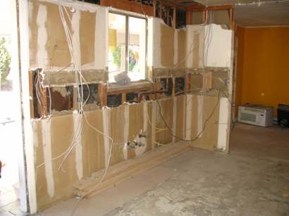 Kitchen before the electrician came.