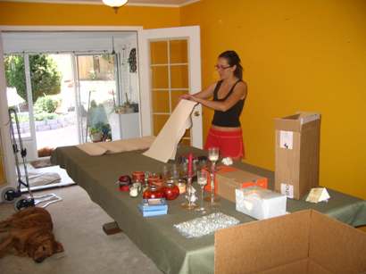 Valeria packing up the kitchen and dining room.