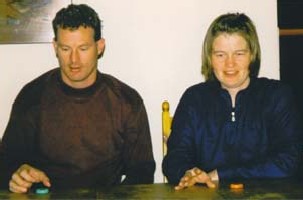 Mark and Hild playing table-curling.