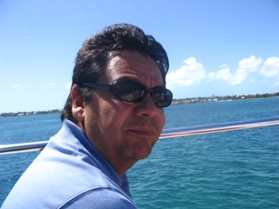 Alvaro enjoying the view from the top of the boat.