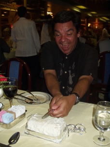 Alvaro cutting the birthday cake.