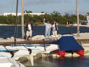 Alvaro, Rob and Kristin waving to the photographer.