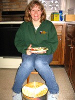 Kristin eating while sitting on her 'krakk'.