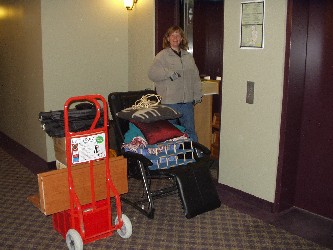 Kristin off-loading the lift on the third floor.