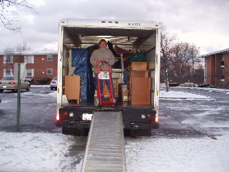 Kristin packing up the truck.