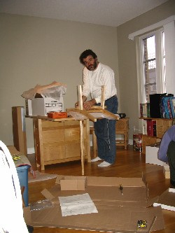 Rob building chairs.