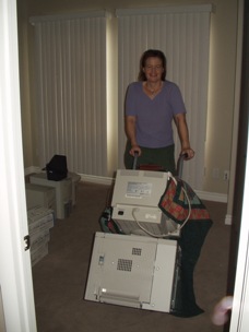 Hild moving computer equipment.