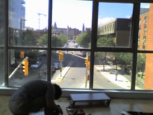 Rob continues assembling a chest of drawers.