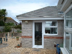 The new extension to the house, and the garden.
