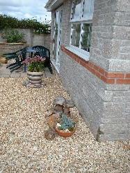 Doors from the extension into the garden.