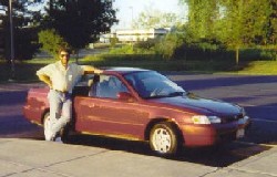 Rob with our latest car: Yogi (named after the bear that 'killed' our previous car).