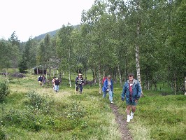 The happy wanderers leaving the cabin at Voglumtveit.