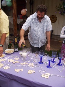 Rob pouring the champagne.