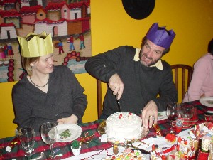 Rob cutting the cake.