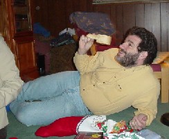 Rob opening his presents - A wooden cup with a large nose (to fit its new owner??! Ho hum!).